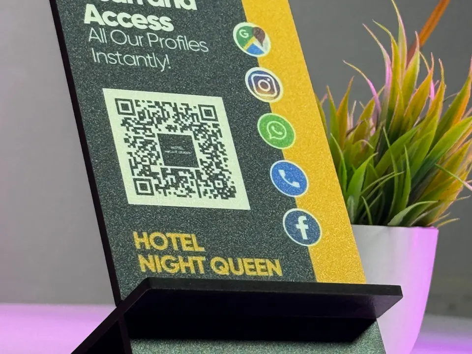 Hotel ScanEra standee with plant